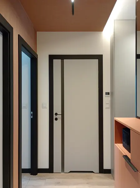 Przedpokój w stylu eklektycznym z industrialnymi i nowoczesnymi akcentami.
