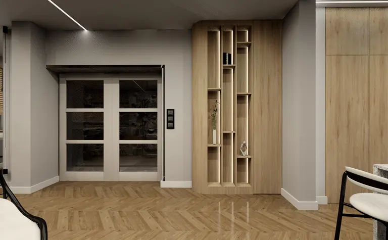 Nowoczesne wnętrze z minimalistyczną ścianką drewnianą i szklanymi drzwiami.