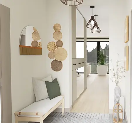 Przedpokój w stylu boho z jasnymi meblami i dekoracjami.