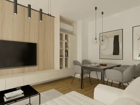 Nowoczesny salon w stylu boho i japandi z szarymi meblami.