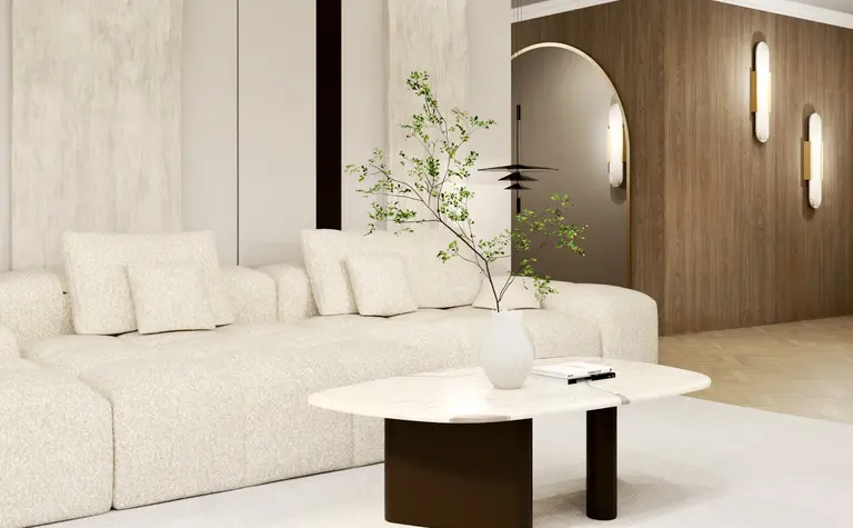 Wnętrze salonu w stylu japandi i minimalistycznym z beżową sofą i drewnianymi detalami.