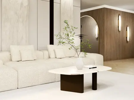 Wnętrze salonu w stylu japandi i minimalistycznym z beżową sofą i drewnianymi detalami.
