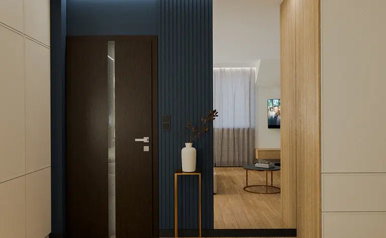 Przedpokój w stylu quiet luxury z niebieskimi ścianami i drewnianą podłogą.