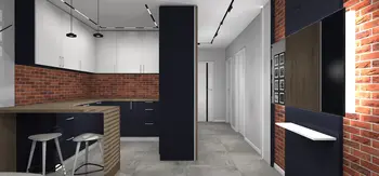 Wnętrze kuchni z ceglaną ścianą, czarnymi meblami, minimalistycznymi i industrialnymi akcentami.