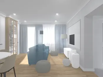 Wnętrze w stylu soft minimalizm z niebieską sofą, białymi meblami i drewnianymi detalami.