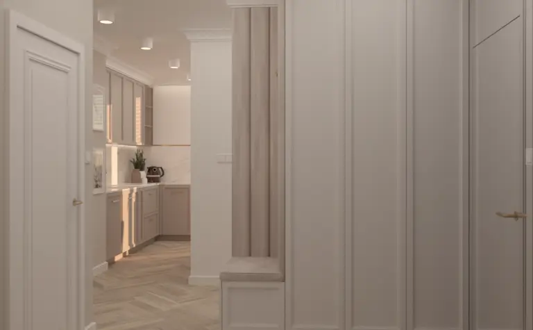 Wnętrze nowoczesnej kuchni w stylu quiet luxury z beżowymi meblami.