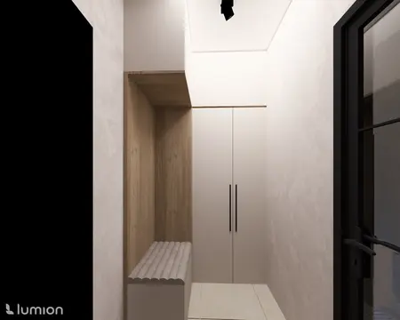 Minimalistyczny przedpokój z białymi meblami i drewnianymi detalami.