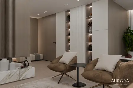 Wnętrze salonu w stylu minimaluxe i nowoczesnym z brązowymi fotelami i białymi akcentami.
