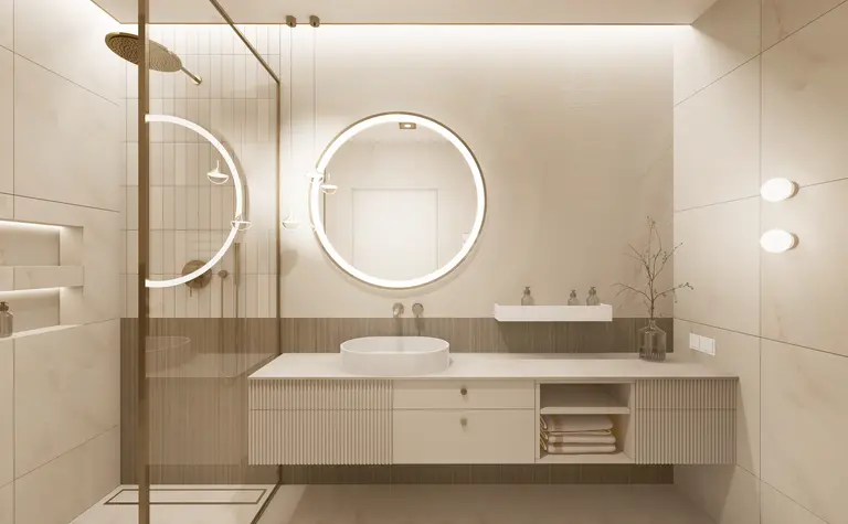 Nowoczesna łazienka z minimalistycznym designem, białymi meblami i okrągłym lustrem