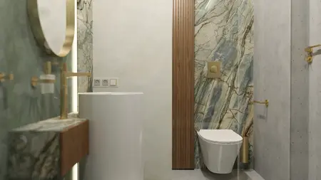 Wnętrze łazienki z marmurowymi ścianami, białą umywalką i złotymi dodatkami w stylu minimaluxe.