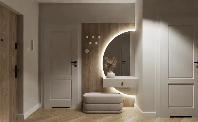 Wnętrze przedpokoju w stylu glamour, japandi i minimalistycznym z drewnianymi akcentami.