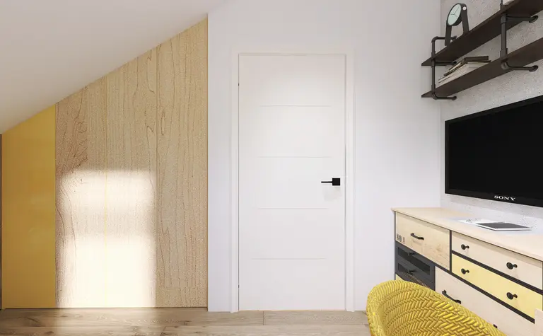 Wnętrze poddasza z drewnianą ścianą i telewizorem w stylu industrialnym.