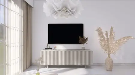 Wnętrze salonu w stylu japandi i minimalistycznym z telewizorem i roślinami.