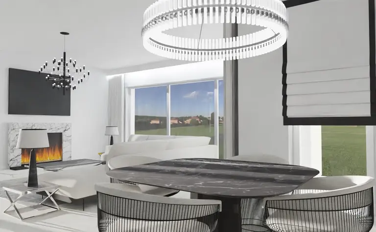 Wnętrze salonu z kominkiem, nowoczesnymi i glamour meblami, w stylu quiet luxury.