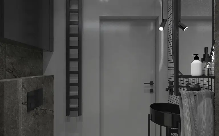 Nowoczesna łazienka z czarnymi i szarymi elementami, industrialny styl.