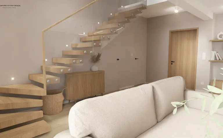 Wnętrze z boho i japandi, drewniane schody, jasna sofa, minimalistyczne akcenty.