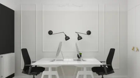 Wnętrze gabinetu z białymi meblami, czarnymi lampami i minimalistycznym designem.