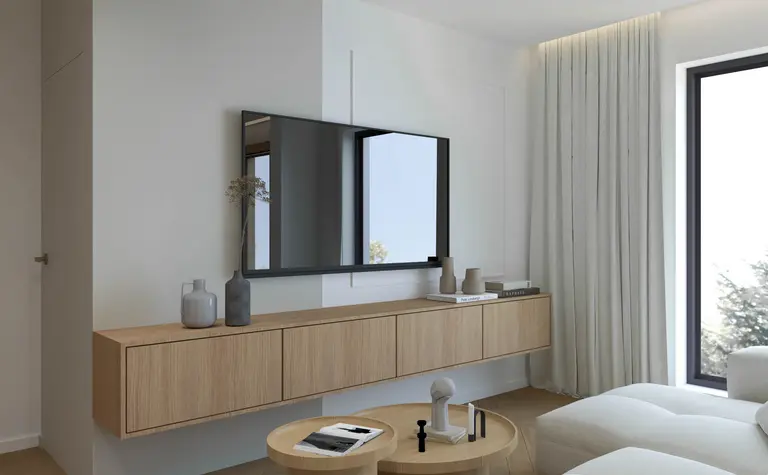 Minimalistyczny salon w stylu japandi z drewnianymi akcentami i dużym lustrem