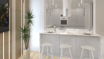 Wnętrze kuchni w stylu japandi, minimaluxe, nowoczesnym i współczesnym z białymi meblami.