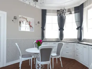 Kuchnia w stylu glamour i tradycyjnym z białymi meblami i dekoracjami.