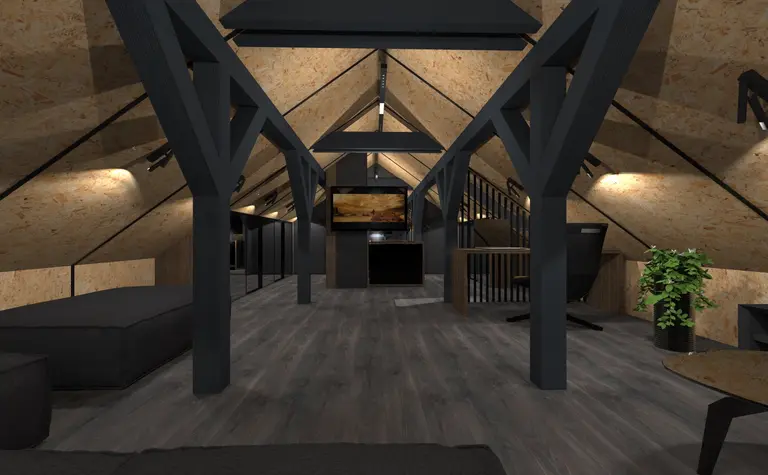Poddasze w stylu industrialnym z ciemnymi meblami i drewnianymi detalami