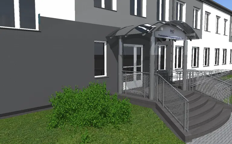 Budynek z wejściem w stylu industrialnym i minimalistycznym, z szarym tłem.