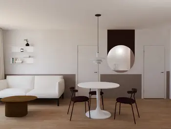 Minimalistyczny salon z białą sofą i okrągłym stołem, skandynawski wystrój.