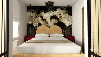Wnętrze sypialni w stylu boho i skandynawskim z łóżkiem i nowoczesną dekoracją.