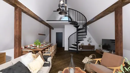 Wnętrze z spiralnymi schodami, drewnianym stołem i nowoczesnymi lampami w stylu industrialnym.