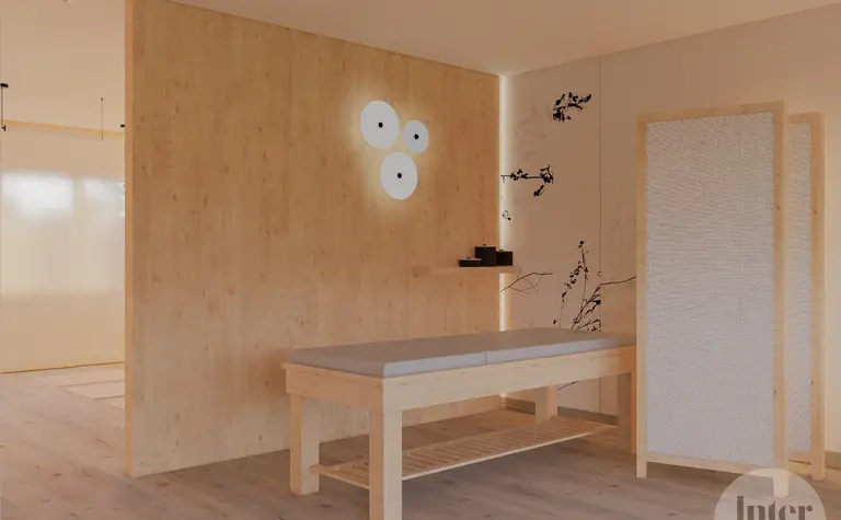 Minimalistyczny gabinet japandi z drewnianą ścianką i lampą.