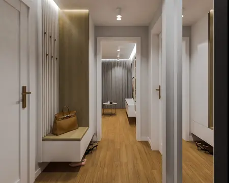 Przedpokój z drewnianą podłogą, białymi meblami i dodatkami w stylu quiet luxury.