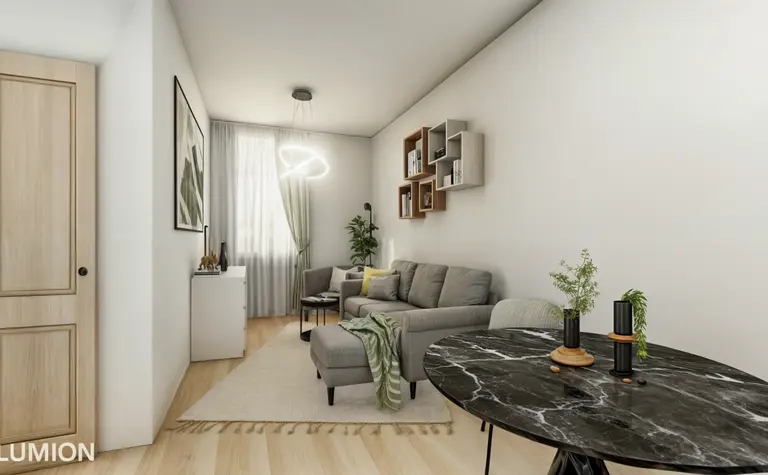 Wnętrze salonu w stylu boho i współczesnym z szarymi meblami i roślinami.