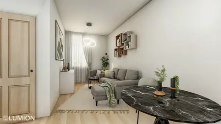 Wnętrze salonu w stylu boho i współczesnym z szarymi meblami i roślinami.