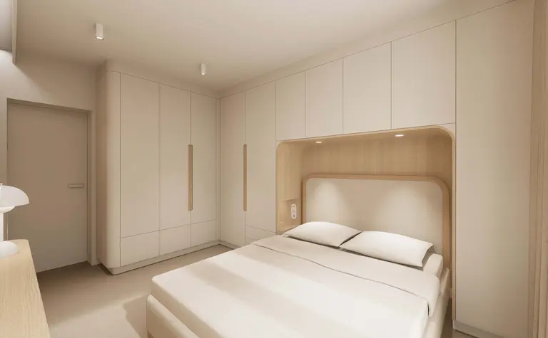 Wnętrze sypialni w stylu japandi i minimalistycznym z jasnymi meblami.