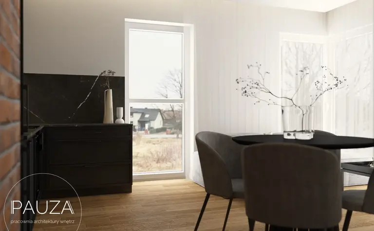 Wnętrze kuchni z czarnymi meblami i drewnianą podłogą, nowoczesny design.