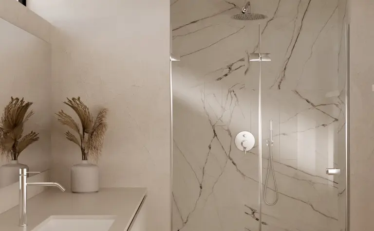 Nowoczesna łazienka w stylu minimalistycznym z prysznicem i jasnymi detalami.