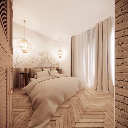 Wnętrze sypialni w stylu boho z beżowym łóżkiem i drewnianą podłogą.