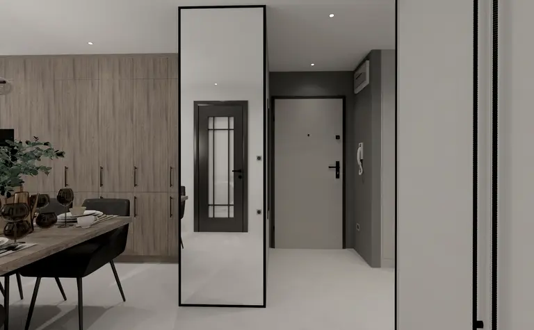 Wnętrze z drewnianą zabudową, białymi meblami i lustrem, nowoczesny design.