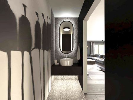 Nowoczesna łazienka z minimalistycznym designem, eklektyczne akcenty.