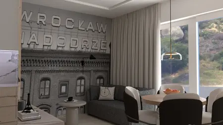 Wnętrze salonu ze szarymi meblami i dużymi oknami w stylu skandynawskim.