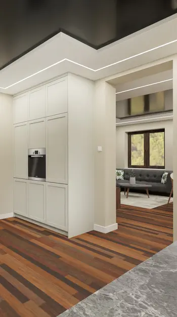 Wnętrze kuchni z białymi meblami i drewnianą podłogą, nowoczesny design.