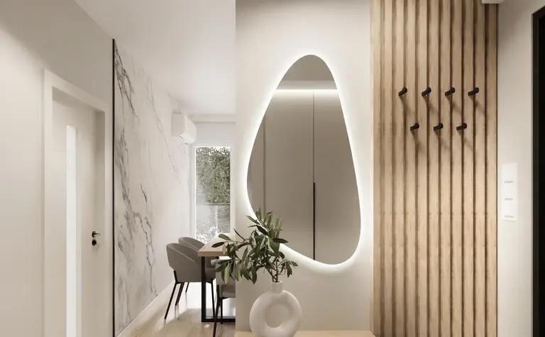 Nowoczesne wnętrze z lustrzanym panelem, drewnianymi akcentami oraz roślinnością. Styl glamour, japandi, minimalistyczny.
