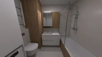 Minimalistyczna łazienka z nowoczesnymi meblami i współczesnym wystrojem.