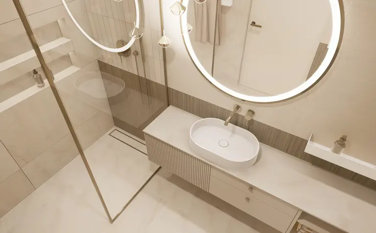 Nowoczesna łazienka z minimalistycznym wystrojem, okrągłymi lustrami i elegancką umywalką.