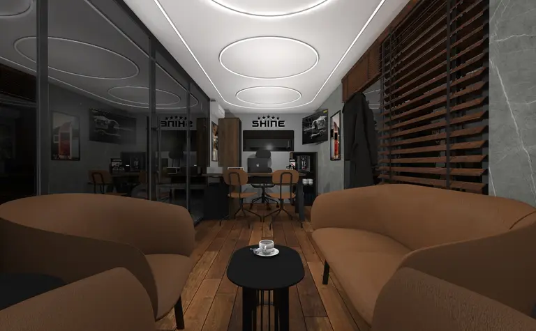 Wnętrze biura w stylu dopamine decor, industrialnym i japandi z brązowymi sofami.