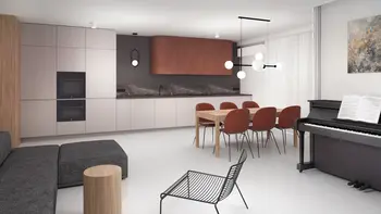 Wnętrze nowoczesnej kuchni z drewnianymi elementami i minimalistycznym designem.
