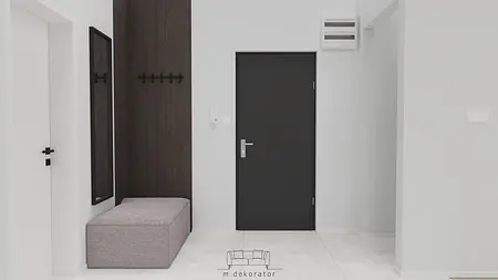 Przedpokój w stylu minimalistycznym z szarymi ścianami, czarnymi drzwiami i drewnianymi detalami.