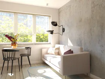 Wnętrze salonu w stylu soft minimalizm z vintage akcentami i współczesnym wystrojem.