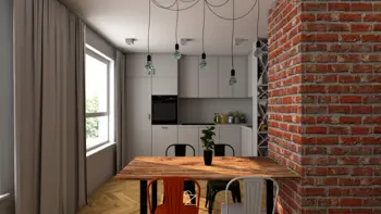 Wnętrze kuchni z ceglaną ścianą, drewnianym stołem oraz nowoczesnymi akcentami industrialnymi i minimalistycznymi.