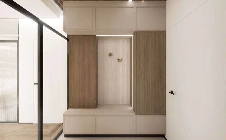 Minimalistyczny przedpokój z drewnianymi szafkami i jasnym tłem, nowoczesny design.